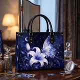 Nyctiris Leather Handbag