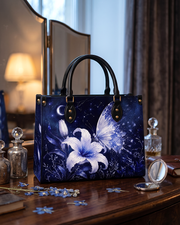 Nyctiris Leather Handbag