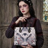 Tearful Iris Leather Handbag
