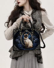 Regal Brocade Leather Handbag
