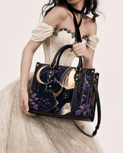 Glimmer Gate Leather Handbag