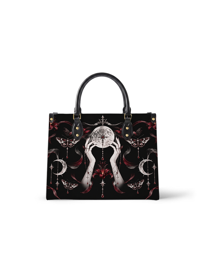 Lunar Rite Leather Handbag