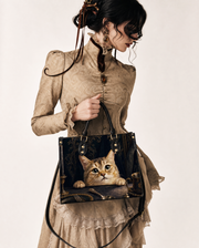 Gilded Peep Leather Handbag