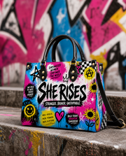 She Rises Leather Handbag