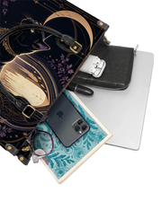 Glimmer Gate Leather Handbag