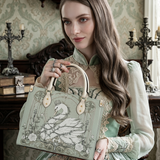 Cygnicide Leather Handbag