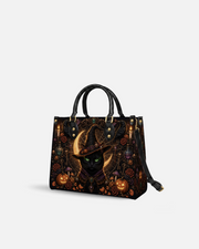 Ebon Feline Leather Handbag