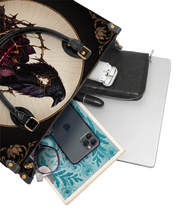 Raven Rite Leather Handbag