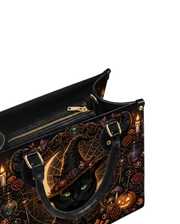 Ebon Feline Leather Handbag
