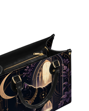 Glimmer Gate Leather Handbag