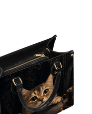 Gilded Peep Leather Handbag