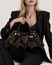 Obsidian Plume Bat Wing Bag