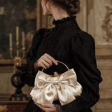 Champagne Bow Satin Clutch