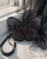 Frayed Denim Butterfly Backpack