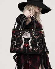 Lunar Rite Leather Handbag
