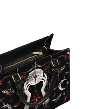 Lunar Rite Leather Handbag