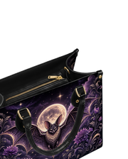 Violet Venom Leather Handbag
