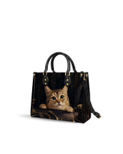 Gilded Peep Leather Handbag